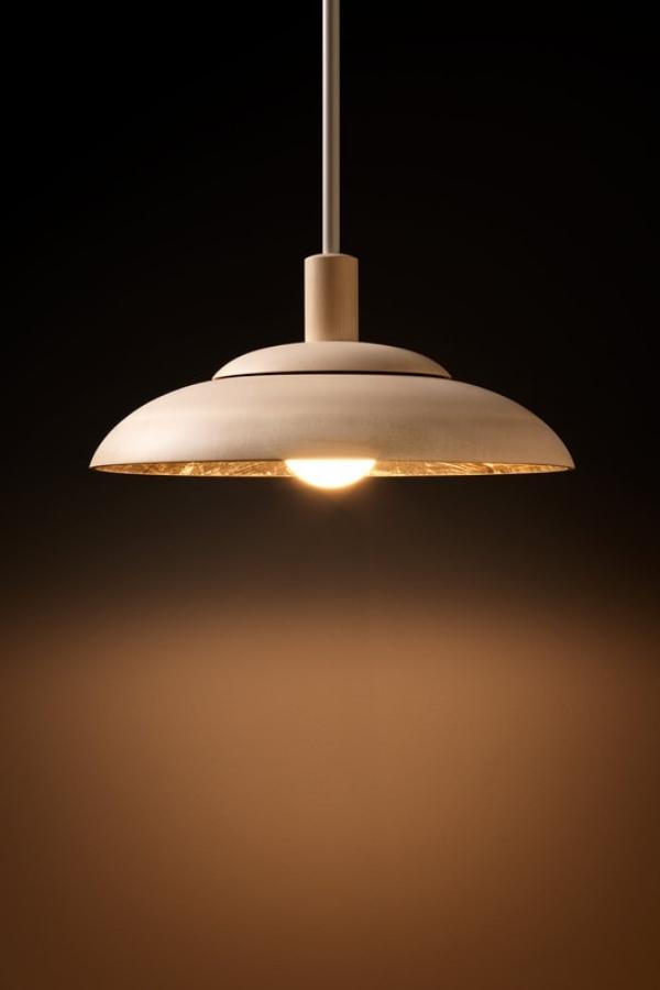 Darren Fry's "Sinclair Pendant Light", made with European marble, white gold and blown glass. Photography courtesy Darren Fry.