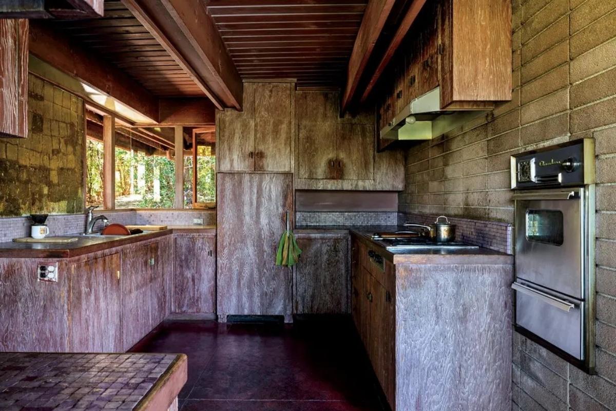 The Douglas fir-clad kitchen still has its original appliances. Photography by Chris Mottalini.