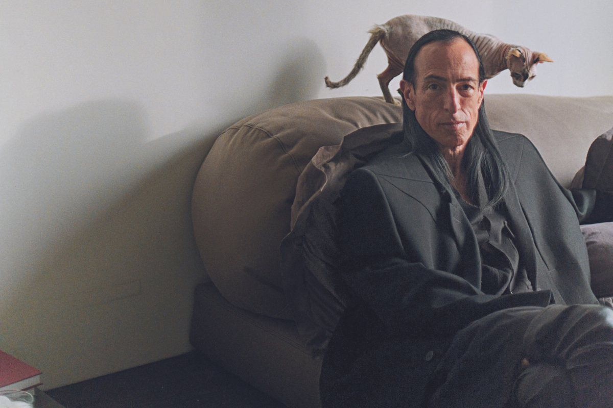 The designer Rick Owens at home with his cat in Paris.