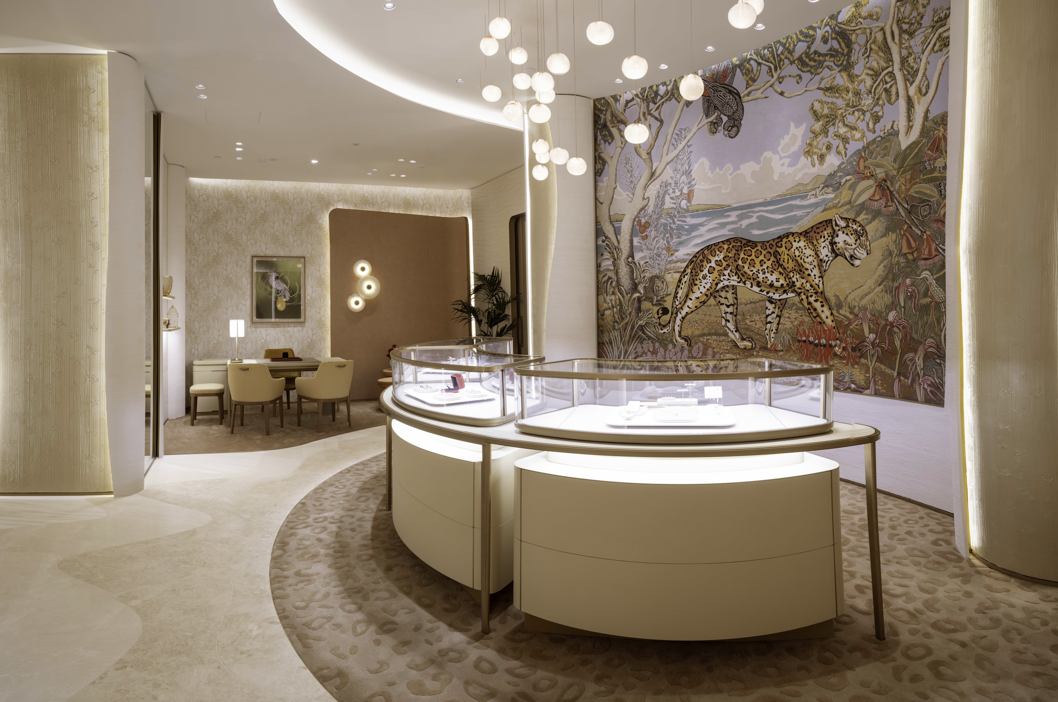The signature wall at Cartier's new boutique is adorned with a tactile custom artwork of the iconic Cartier panther.